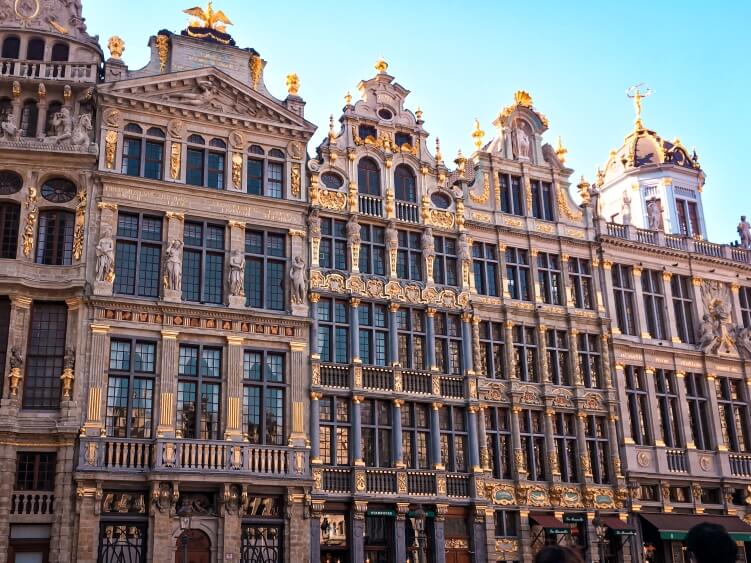 The famous facades of 17th-century buildings decorated with intricate golden details at Grand Place.  A must-see place if you only have one day in Brussels. 