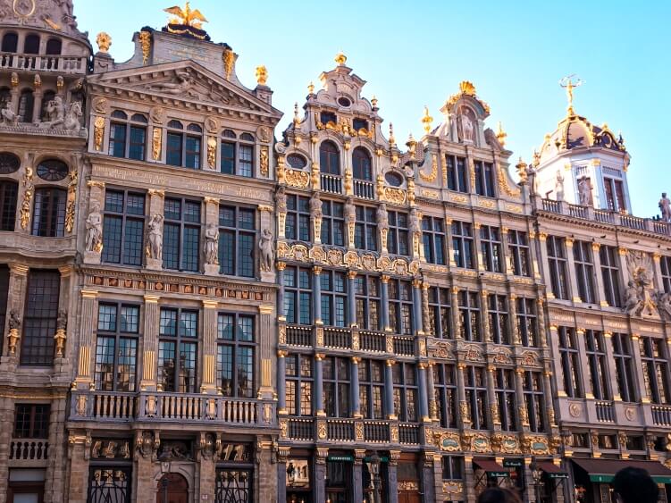 The famous facades of 17th-century buildings decorated with intricate golden details at Grand Place.  A must-see place if you only have one day in Brussels. 