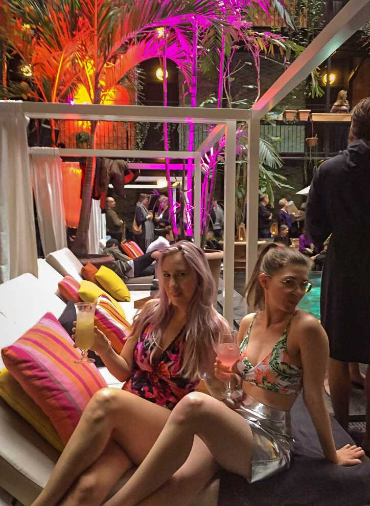 Girls enjoying cocktails at the Manon Les Suites pool in Copenhagen