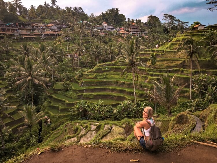 a view over lush green Tegalalang rice terraces in Bali