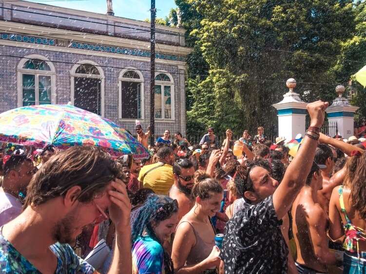 People celebrating the Rio de Janeiro carnival at one of the many street parties taking place in the city