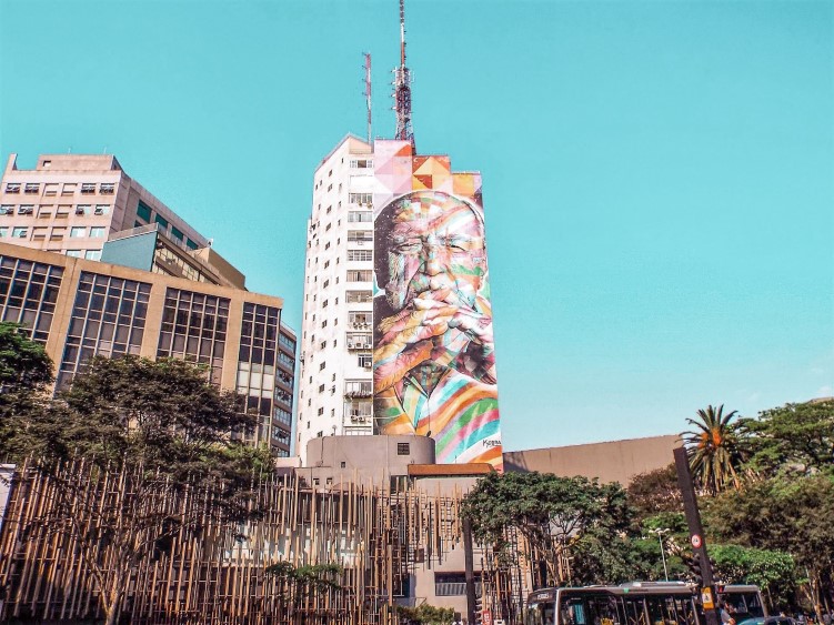 A colorful mural on Paulista Avenue depicting Oscar Niemeyer, a famous Brazilian architect