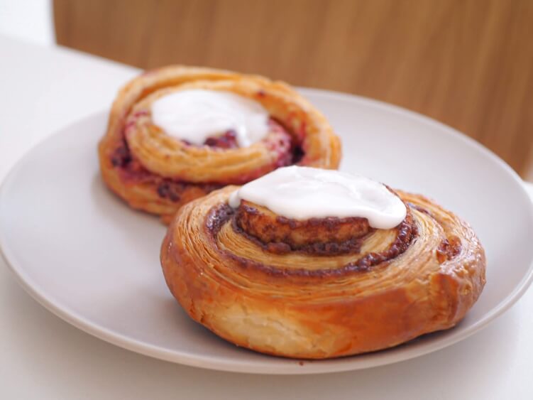 Kanelsnegl, a Danish pastry filled with cinnamon and topped with icing