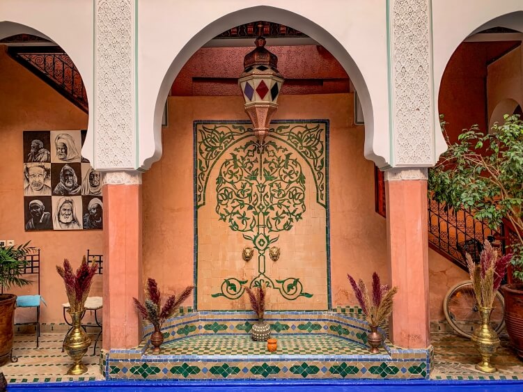 courtyard of a Moroccan riad; a better accommodation choice than a chain hotel if you want to practice responsible travel in Morocco