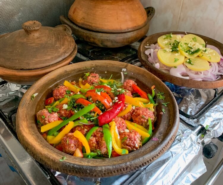 meatball tagine and lemon-chicken tagine in a cooking class in Chefchaouen, Morocco