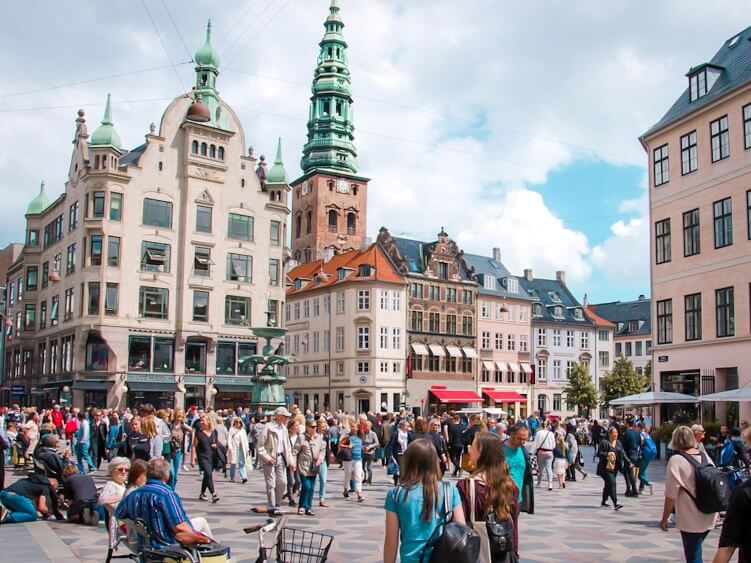 Crowds of people on Stroget, Copenhagen's main shopping street and one of the longest pedestrian streets in Europe