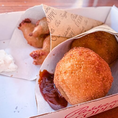 crunchy golden arancini, Sicilian street food