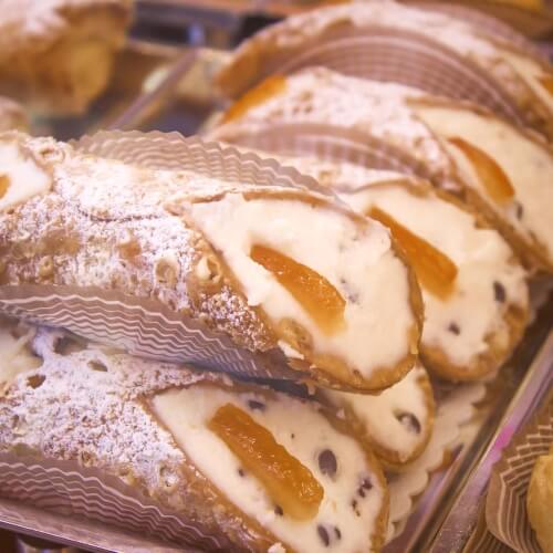 fresh cannoli, a Sicilian pastry filled with ricotta cream