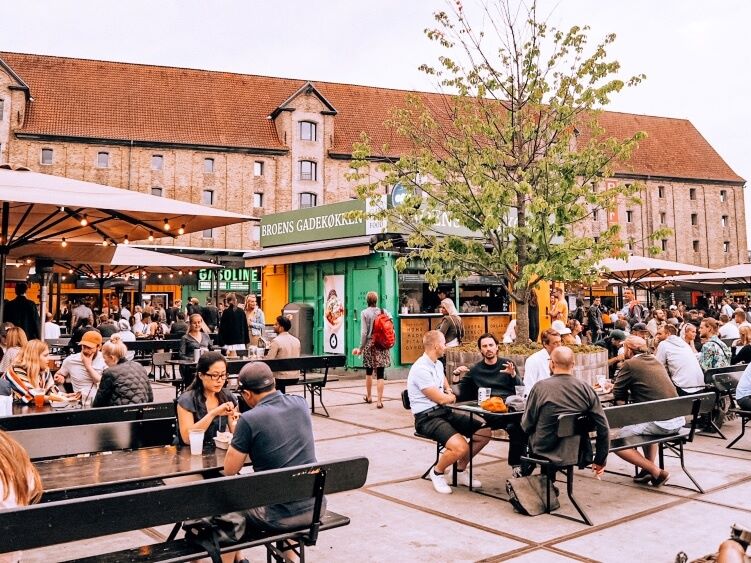 The outdoor seating area of Broens Gadekokken, one of the best places to buy street food in Copenhagen