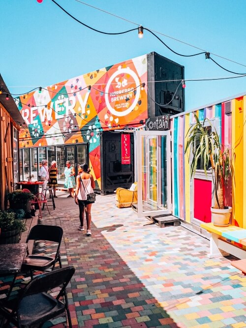 brightly colored shipping containers converted into street food stalls at Reffen market