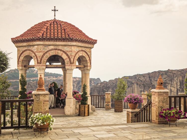 A small pavilion on the terrace of Varlaam monastery overlooking a valley