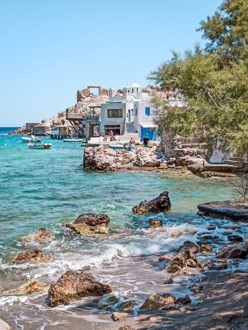 Gentle waves hitting the rocks at Firopotamos Beach