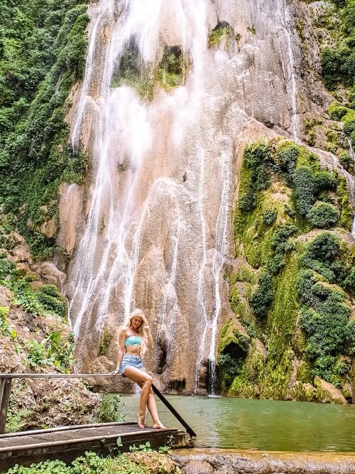 Me posing in front of Boca da Onca waterfall in Bonito, an ecotourism hub that you should visit if you have 10 days in Brazil