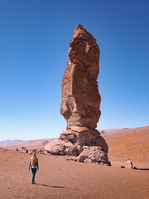 A huge vertical rock pillar know as Monjes de la Pacana in the Atacama Desert