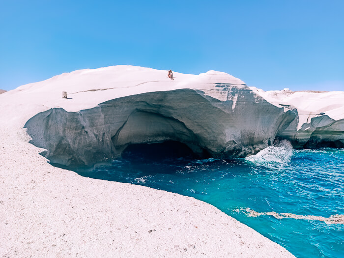 A moon-like coastal landscape consisting of white volcanic cliffs at Sarakiniko Beach, a must-visit place on Milos 