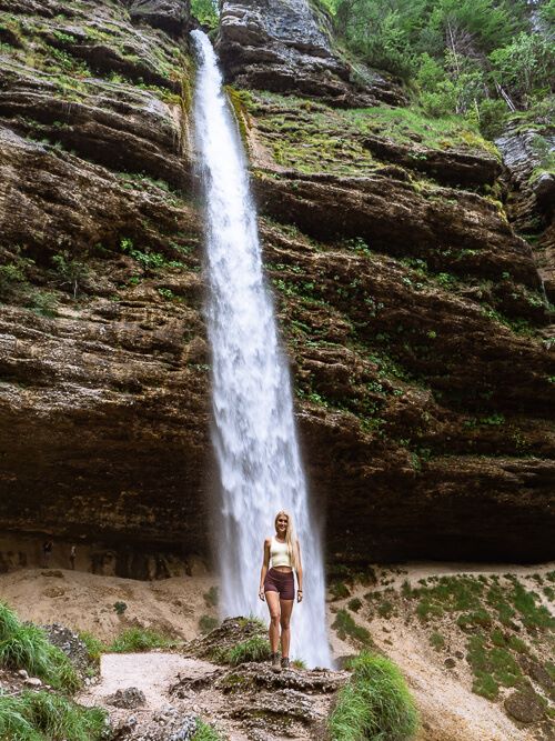 Me standing in front of Slap Peričnik Waterfall in Triglav National Park, Slovenia
