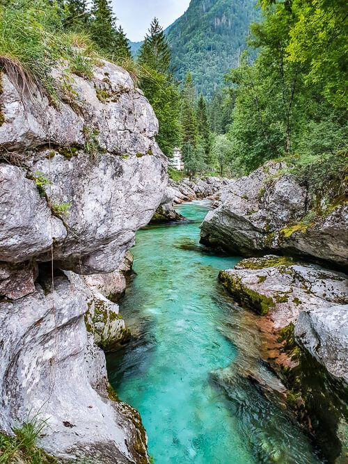 Turquoise blue river on the bottom of Small Soca Gorge.