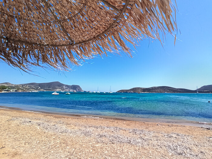 Golden sand and blue water at Agios Georgios Beach located on the southern coast of Antiparos Island