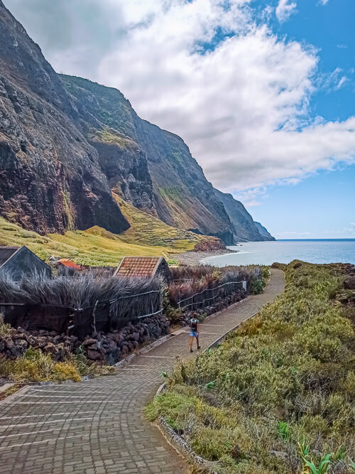 A coastal trail next to towering cliffs at Achadas da Cruz, one of the hidden gems of Madeira