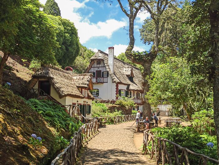 A picturesque thatched-roof house at Parque Florestal das Queimadas on Madeira Island.