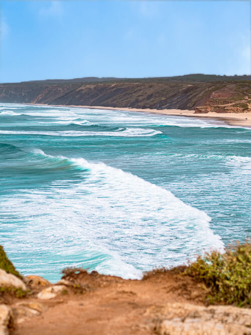 Strong Atlantic Ocean waves at Praia da Bordeira beach near Carrapateira