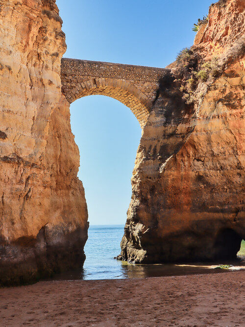 A roman-style bridge at Praia dos Estudantes in the Algarve