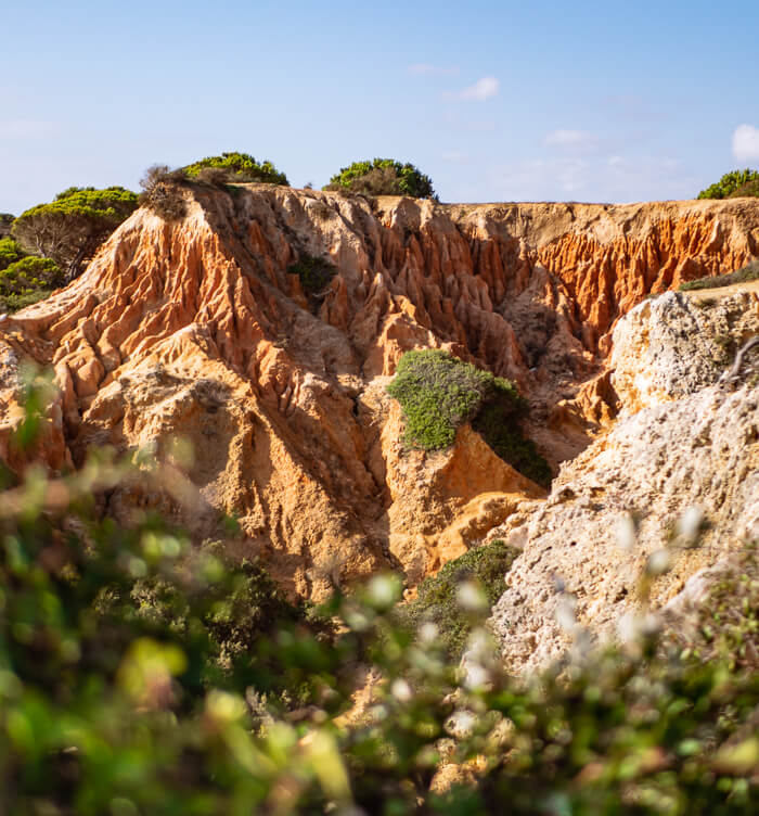 Colorful limestone cliffs at the Seven Hanging Valleys Trail, one of the best hikes in Algarve