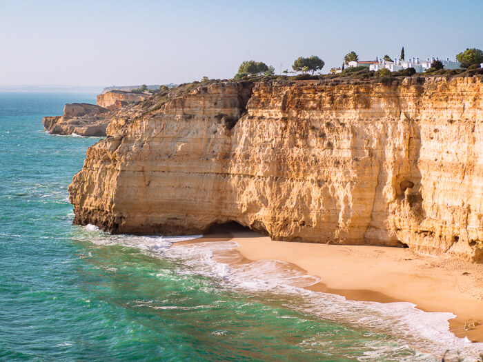 Tall cliffs of the Vale de Centeanes Beach viewed from the Seven Hanging Valleys Trail