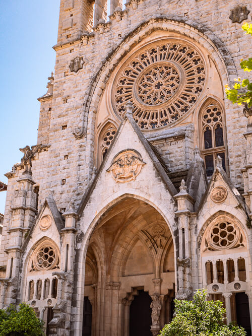The inticate Neo-Gothic facade of Sant Bartomeu Church, one of the top attracions in Soller