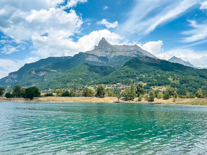 Clear blue water and mountainous scenery at Passy Lake, a great day trip from Chamonix