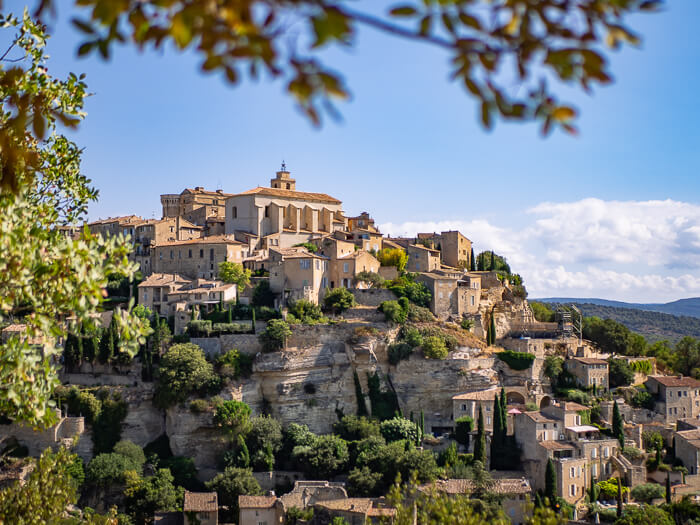A panoramic view of the medieval hilltop village of Gordes, a must-visit stop on any Provence road trip itinerary