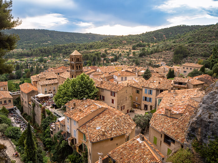 Terracotta-colored roofs of Moustiers-Sainte-Marie village, one of the best places to visit in this southern France itinerary.