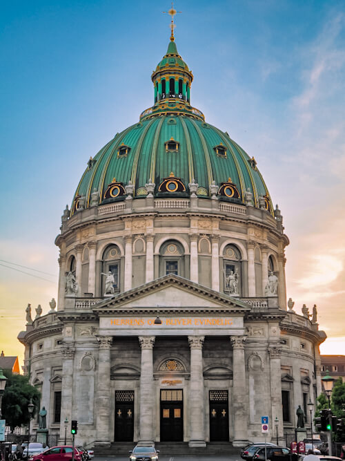 Frederik's Church, also known as Marble Church with its green copper dome and golden details in Copenhagen, Denmark