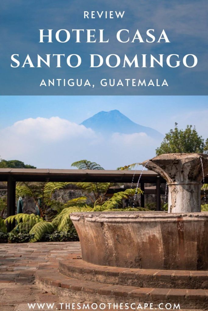 A Pinterest pin with an image of an old fountain and a text overlay stating: Review - Hotel Casa Santo Domingo, Antigua, Guatemala.