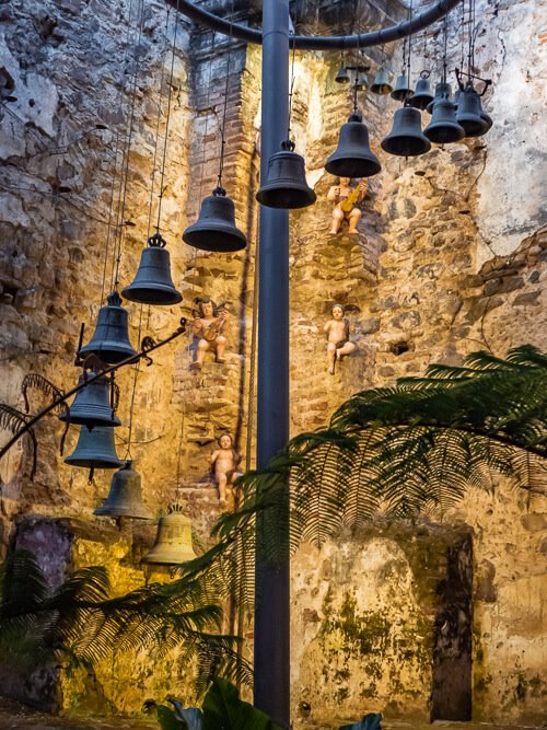 An art installation consisting of church bells arranged in a spiral shape