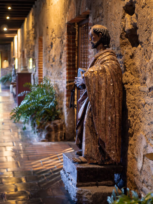 An old religious statue in Hotel Museo Spa Casa Santo Domingo
