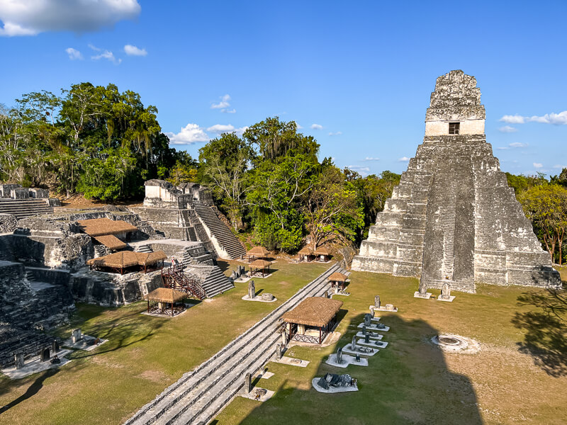 A view over Tikal Grand Plaza and Temple I, a must-visit place when visiting Tikal ruins