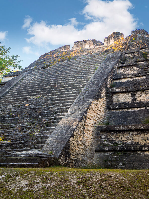 An old crumbling stairway leading to the top of a Mayan temple in Tikal