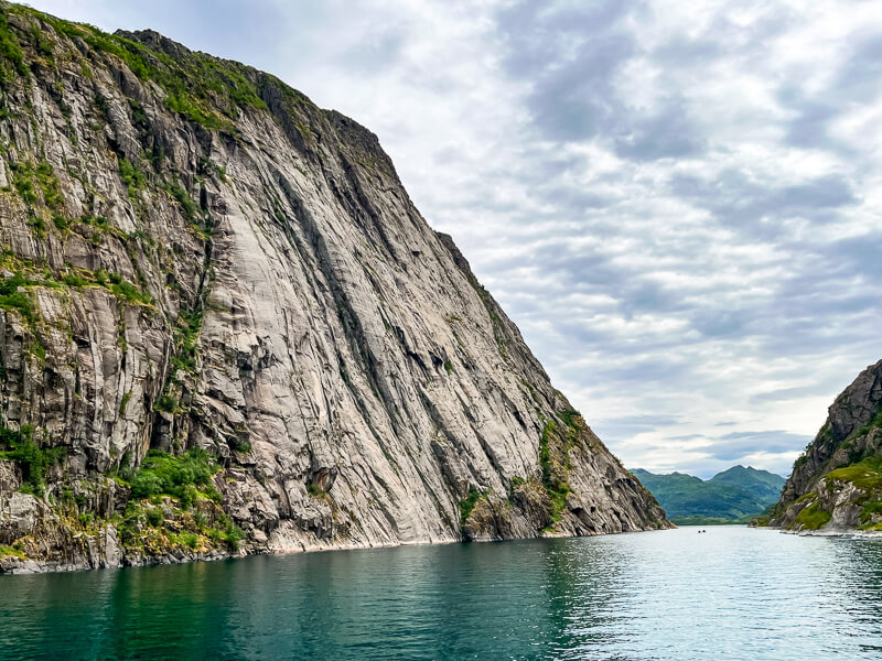 Steep rock walls at the opening of Trollfjord, one of the most famous fjords in Lofoten