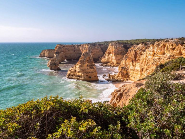 a beach with golden cliffs in Algarve in winter