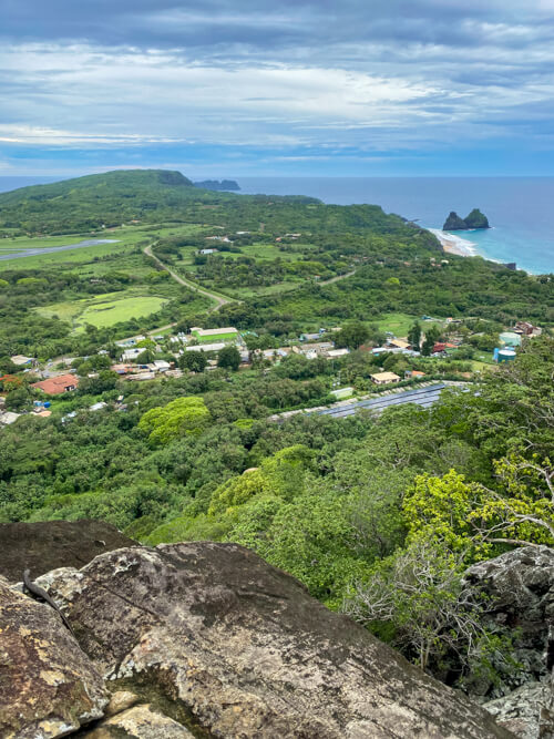 A view from the Piquinho hill over the lush green landscape of Noronha.