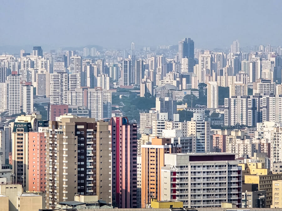 An aerial view of countless high-rise buildings stretching as far as the eye can see in Sao Paulo city.