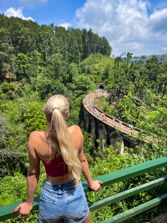 Me admiring the view of the Nine Arch Bridge and the lush greenery around it.