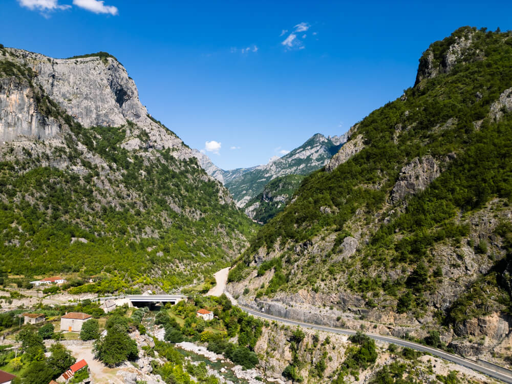The rugged limestone peaks of the Accursed Mountains surrounding the scenic SH20 road in northern Albania.