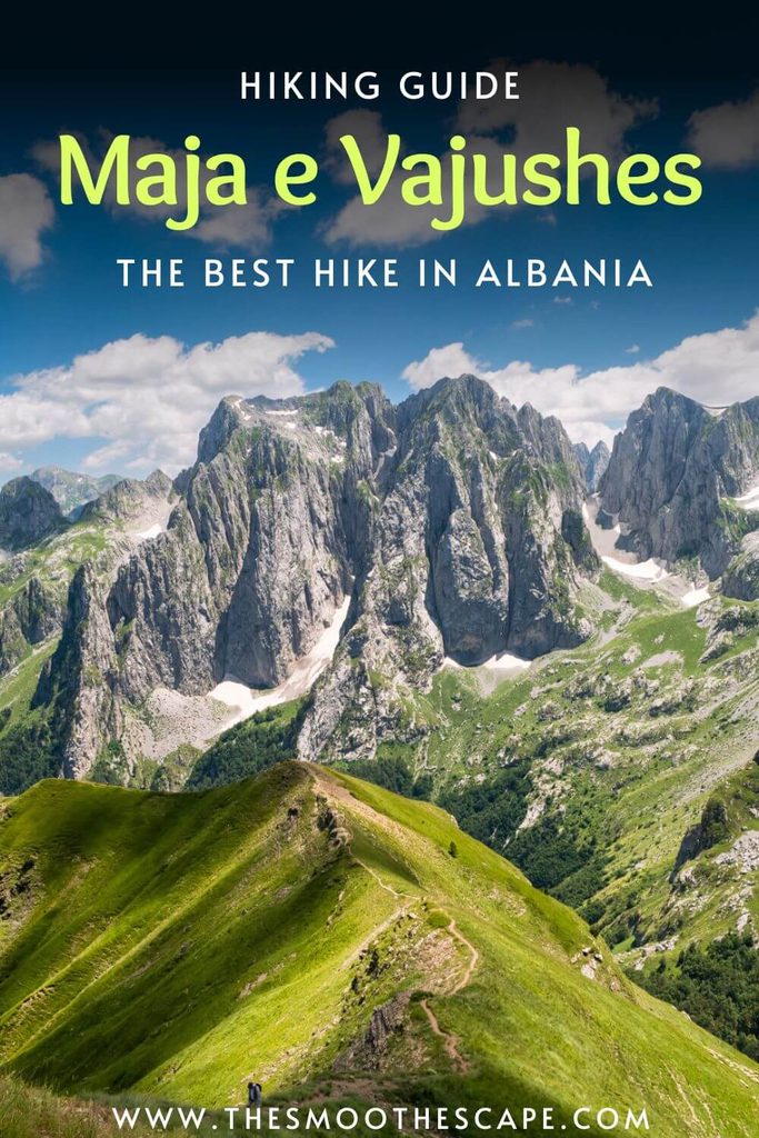 A Pinterest pin with an image of a hiking trail winding along a ridge towards towering grey peaks and a text overlay stating: Hiking guide: Maja e Vajushes, the best hike in Albania.